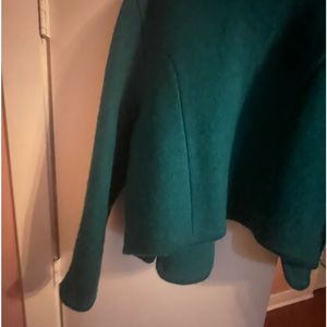 A very rare item of Carroll Reed, emerald green wool cardigan .